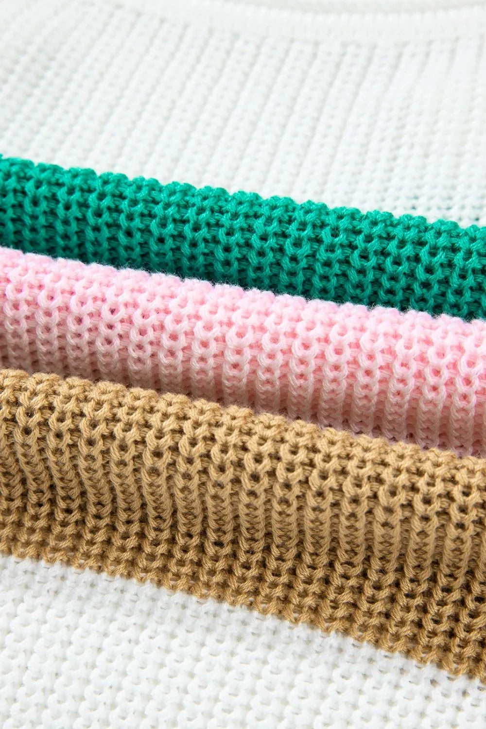Colorblock knit tee in white, green, pink, and tan acrylic with a V-neck.