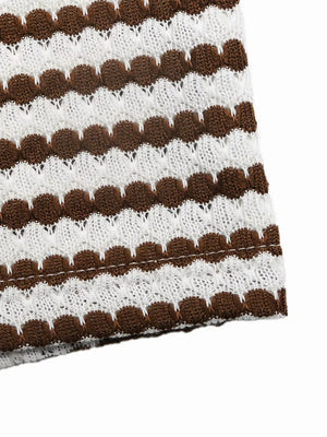 Halter neck bodycon midi dress in brown and white stripe crochet knit fabric.