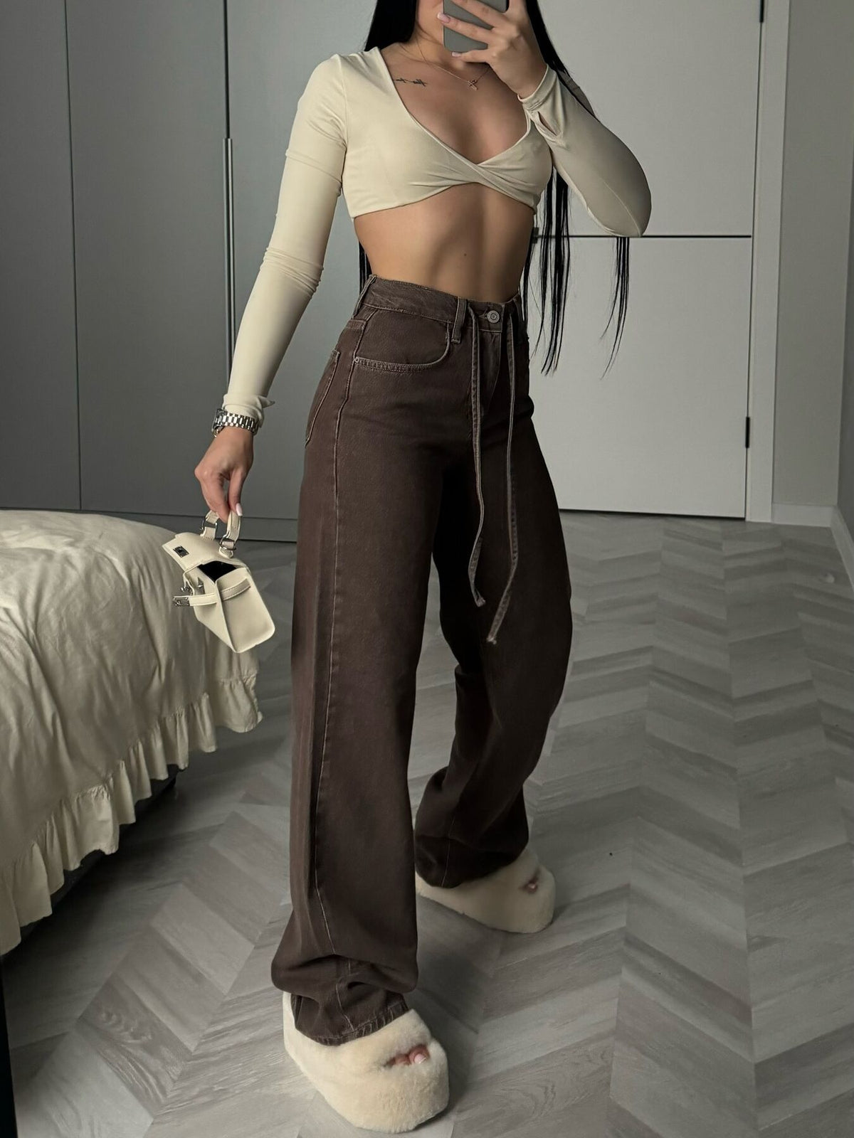 wide-leg jeans in dark brown featuring drawstring waist and flared fit