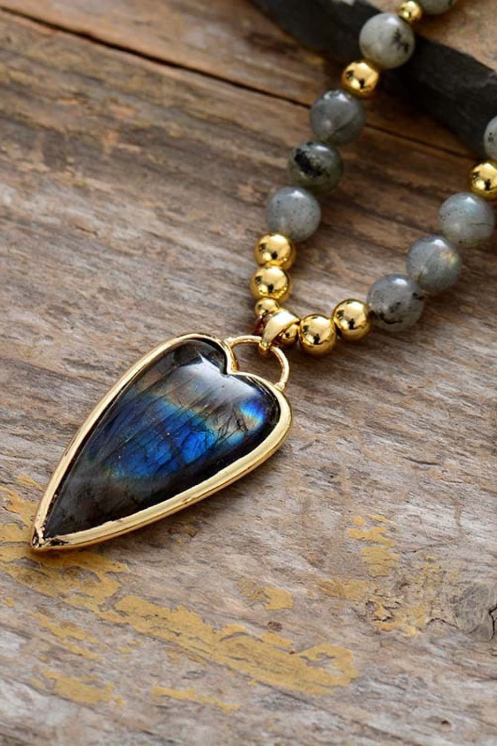 Heart pendant necklace with blue labradorite and gold beads
