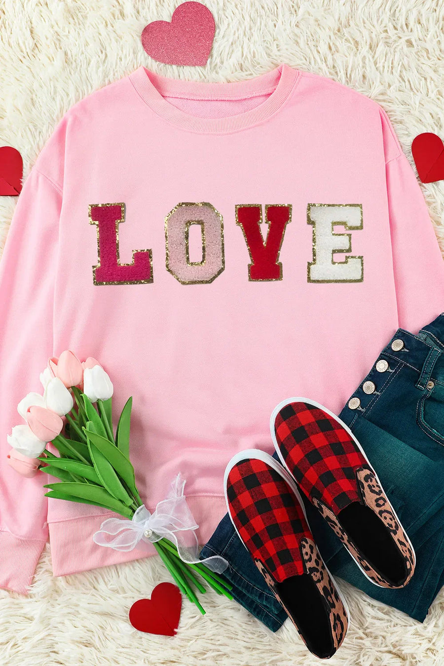 Blush pink sweatshirt with embellished LOVE letters, crewneck, long sleeves.