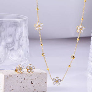 gold jewelry set with adjustable length and clasp