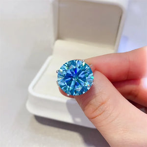 Celestial blue statement ring in silver with large round cut blue stone