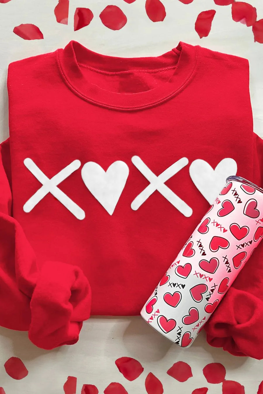Red crewneck sweatshirt with white XOXO graphic and hearts.