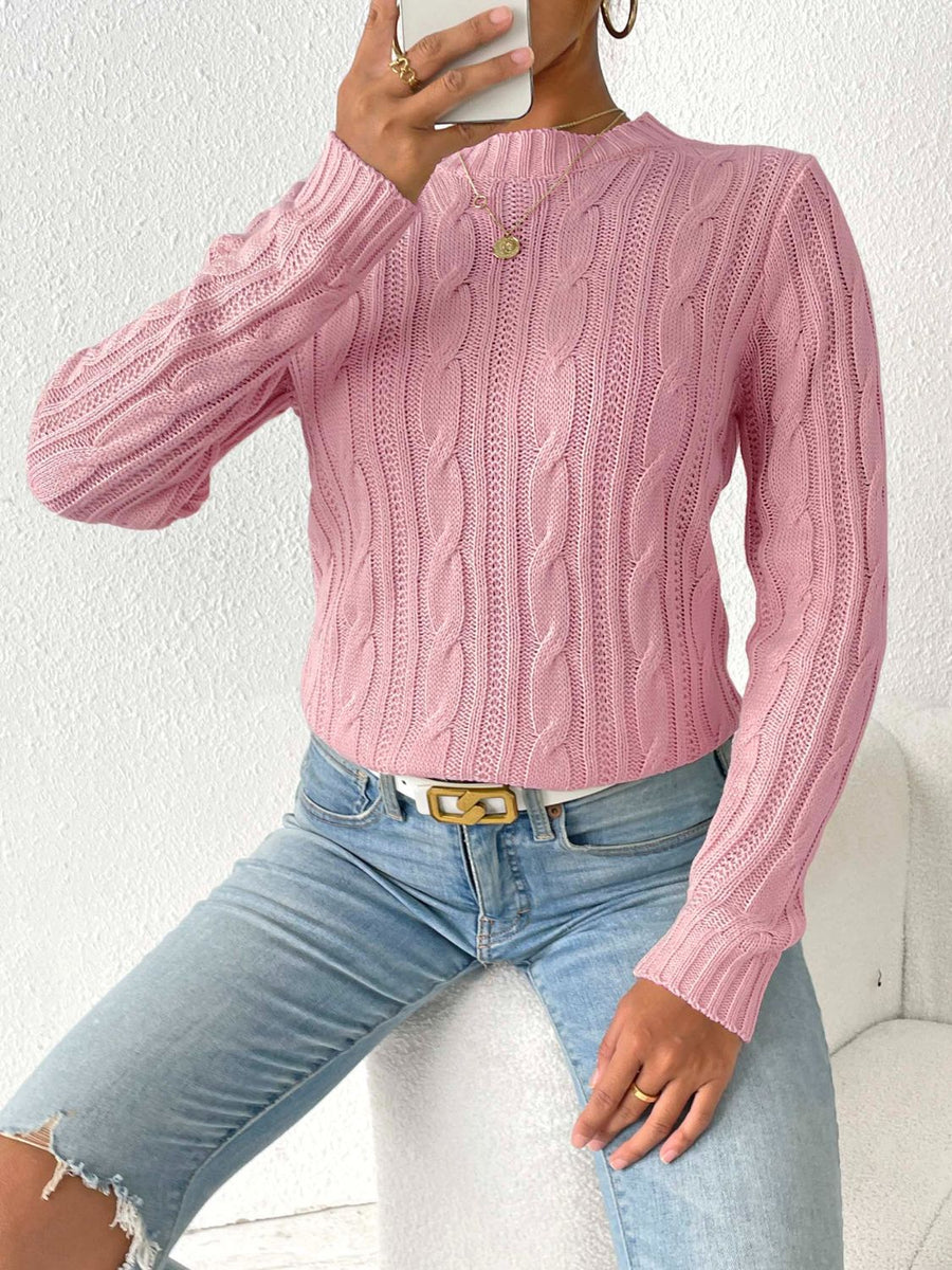 Dusty Pink cable knit mock neck sweater with long sleeves.