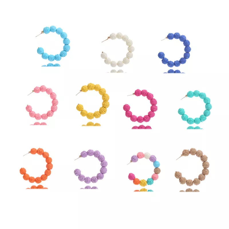 Raffia grass C-hoop earrings in yellow, purple, brown, red, pink, sapphire blue, orange, beige, blue green, and color