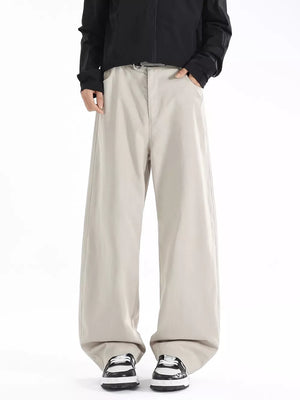 Men's beige wide-leg casual pants with a relaxed fit and belt detail.