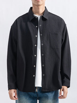 Light Gray button-down shirt featuring chest pocket and textured
