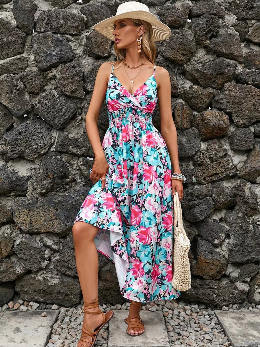 Maxi dress with floral print, v-neck, spaghetti straps, smocked waist, and high-low hem
