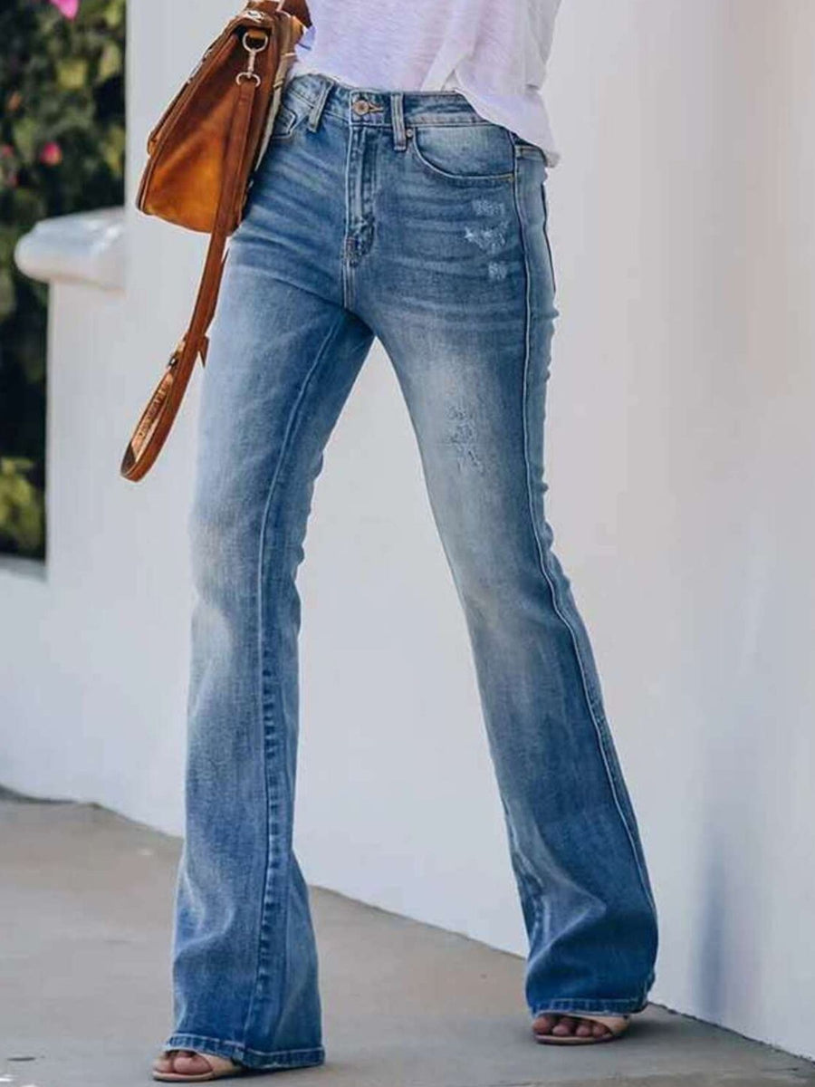 85% cotton, 15% polyester Care instructions: Machine wash cold flare jeans in Blue with flared silhouette