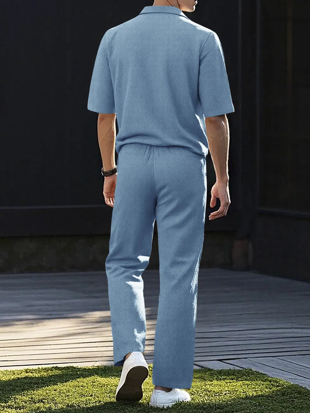 Light blue textured polo shirt and matching drawstring pants set