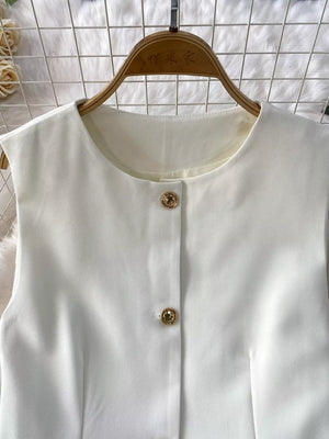 White belted two-piece set with gold button detail and pockets