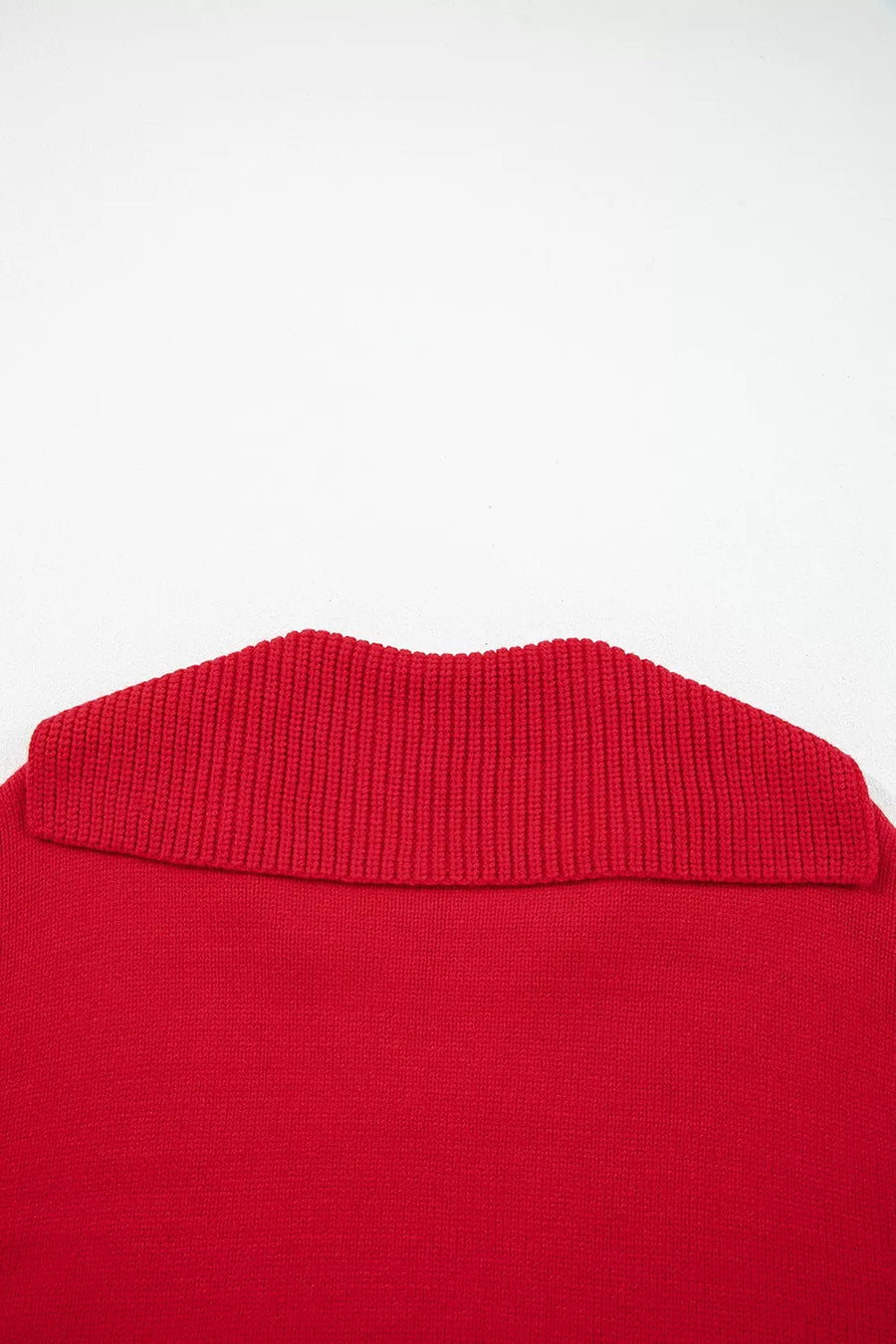 red pullover sweater with ribbed cuffs and long sleeve