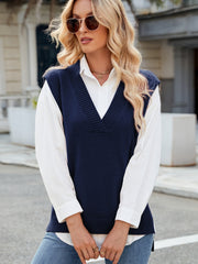 Dark Blue ribbed knit V-neck sweater vest with a white collared shirt and jeans.