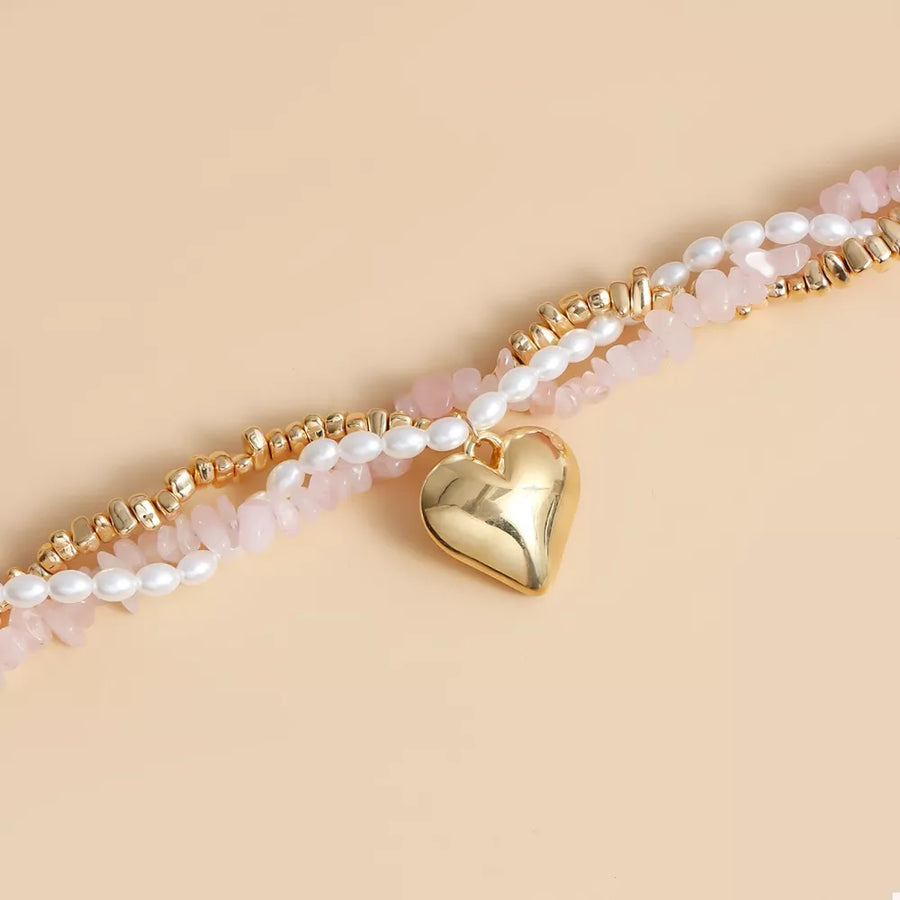 necklace in blush pink with three-layered and choker