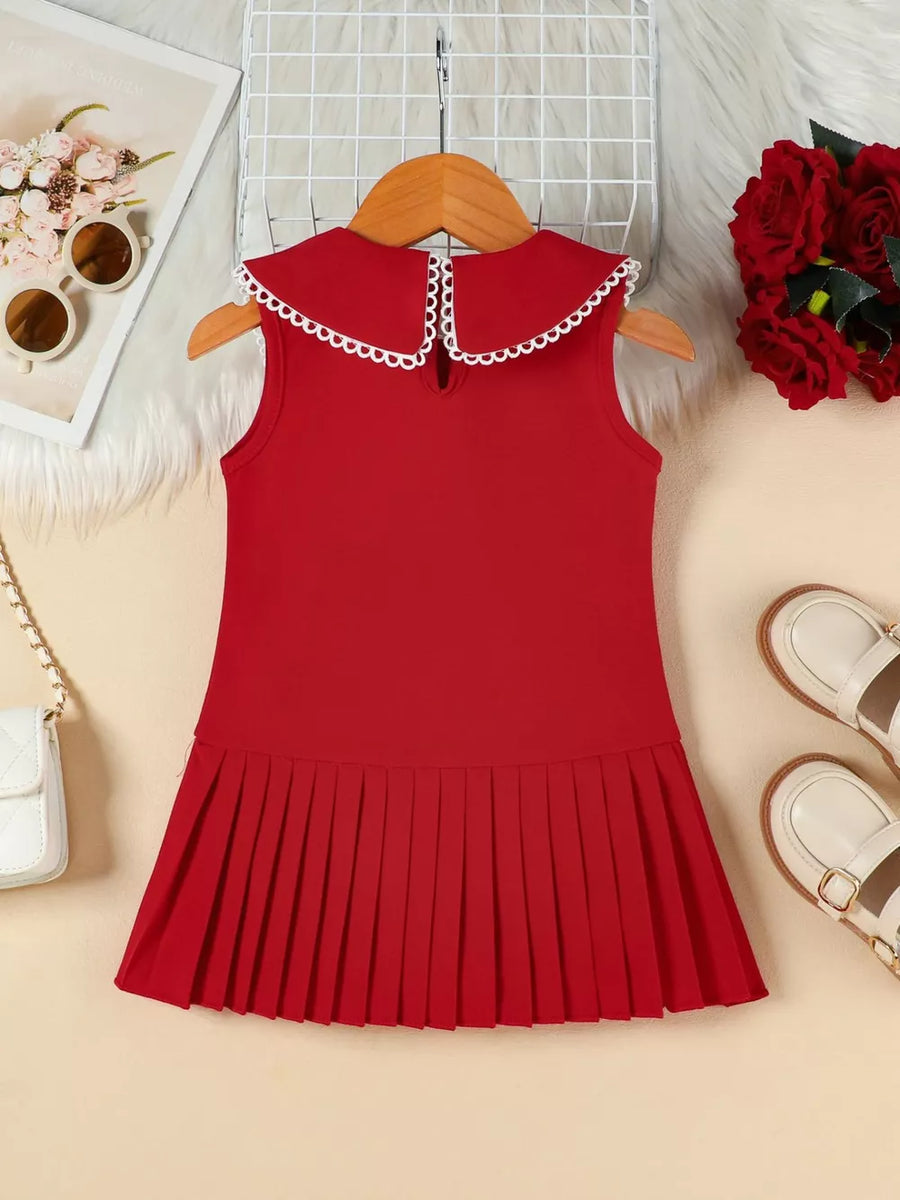 Red toddler dress with lace-trimmed collar and pleated skirt