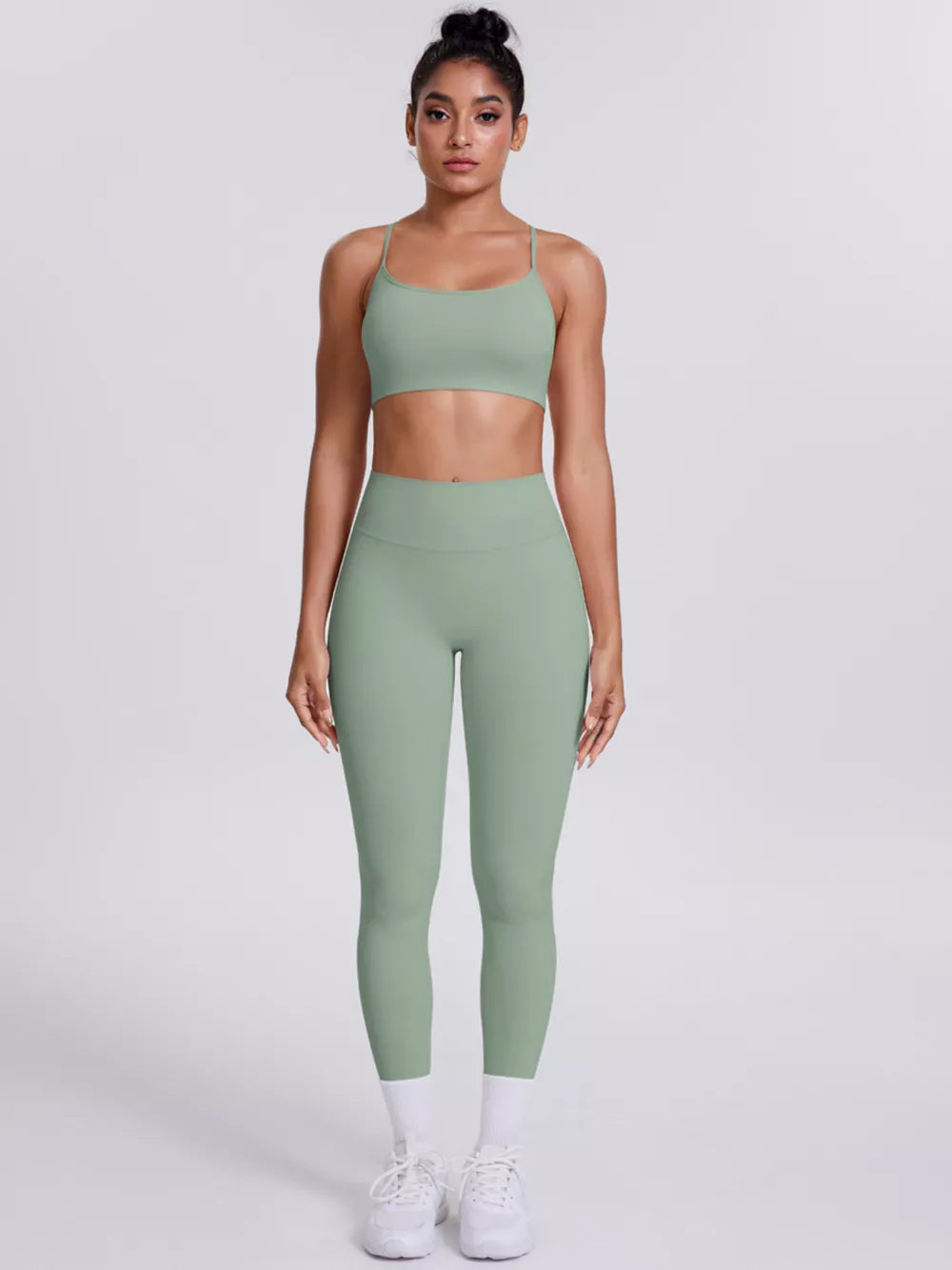 80% nylon, 20% spandex Care instructions: Machine wash cold sports bra in Light Gray with fitted silhouette