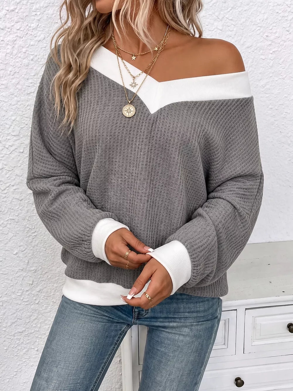 v-neck sweater in slate gray featuring basic style and relaxed fit