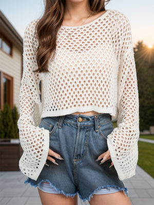 Cream open-knit cropped sweater with bell sleeves and a relaxed fit.