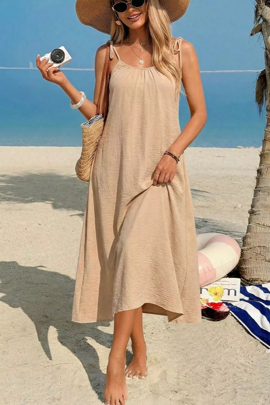 Effortless midi dress in beige cotton blend with tie shoulders and textured fabric.