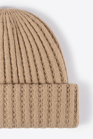 Beige acrylic ribbed knit beanie with textured detail