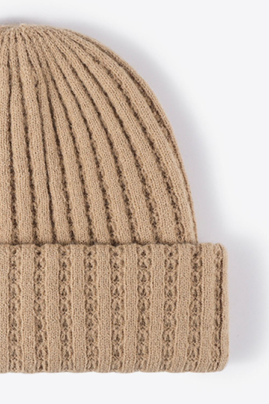Beige acrylic ribbed knit beanie with textured detail