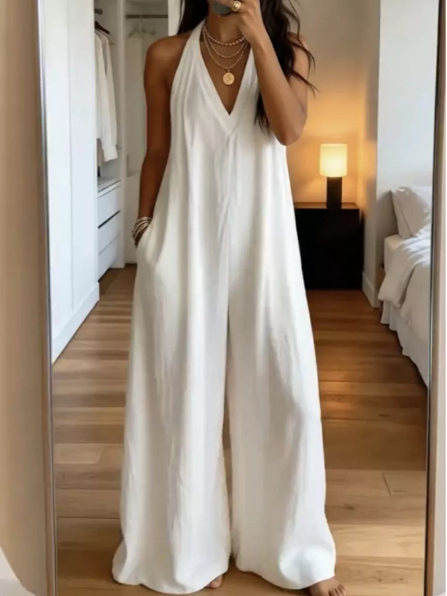 100% polyester Care instructions: Machine wash cold jumpsuit in White with relaxed silhouette