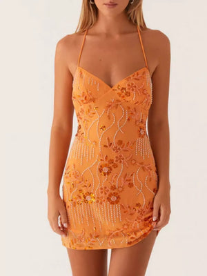 Tangerine embellished floral mini dress with halter neck and beaded fringe detail.