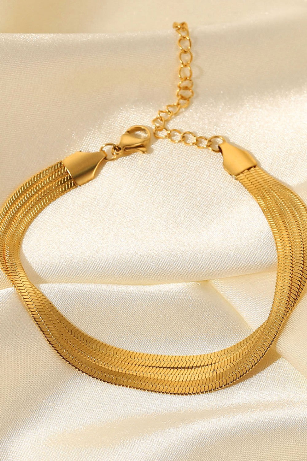 Gold triple herringbone chain bracelet with adjustable clasp