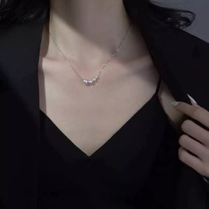ivory necklace with princess-length and clasp