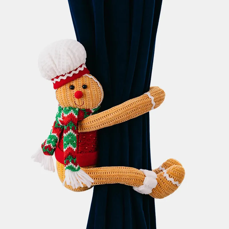 Gingerbread man curtain tieback with red vest, green and red scarf, and white chef hat.