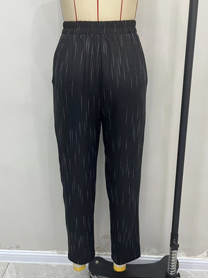 100% polyester Care instructions: Machine wash cold pants in Navy with loose silhouette
