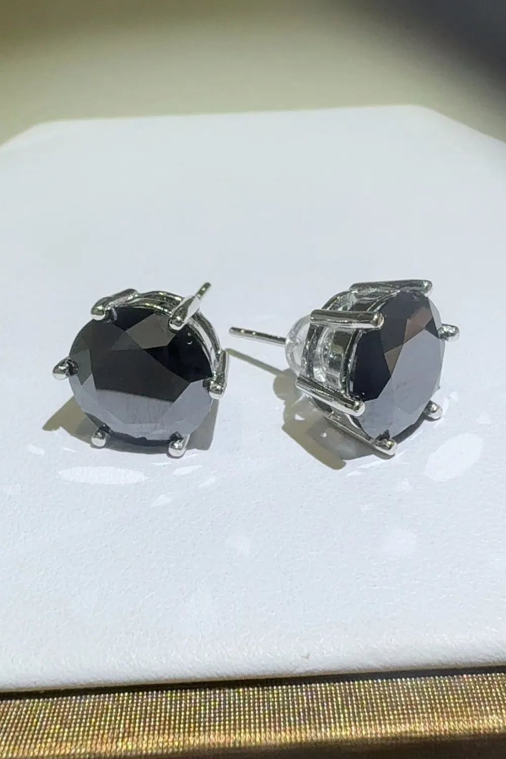 Black moissanite stud earrings with six-prong setting