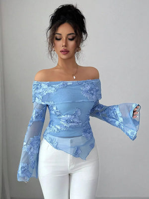 Sky blue floral ruffled off-shoulder blouse with sheer bell sleeves and appliqué details.