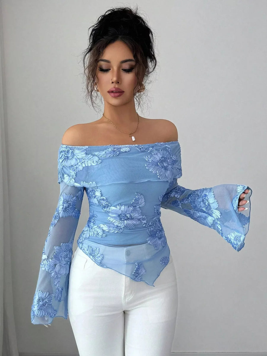 Sky blue floral ruffled off-shoulder blouse with sheer bell sleeves and appliqué details.