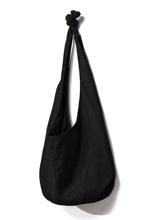 Black canvas shoulder bag with knotted strap detail