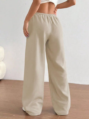 Tan wide-leg maternity joggers with elastic waistband