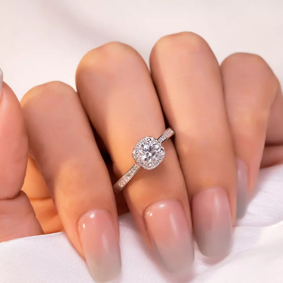 925 sterling silver,Moissanite Carat weight: 2ct Care instructions: Avoid wearin ring in clear with straight silhouette