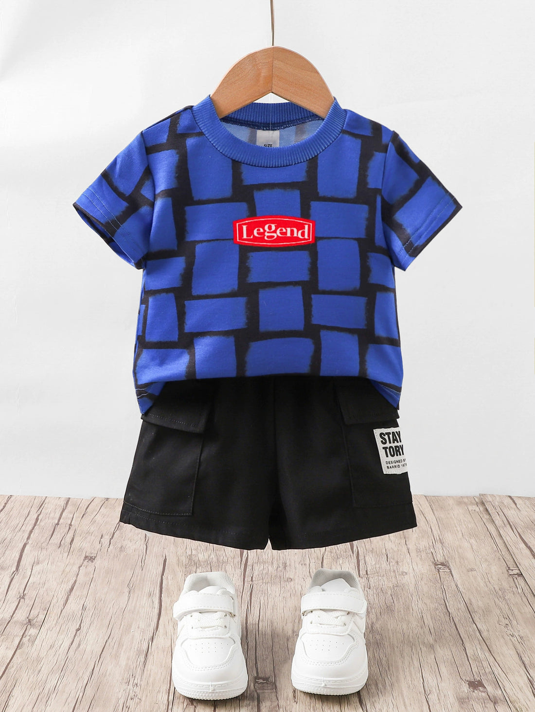 Children's blue graphic tee with "Legend" detail and black cargo shorts set.