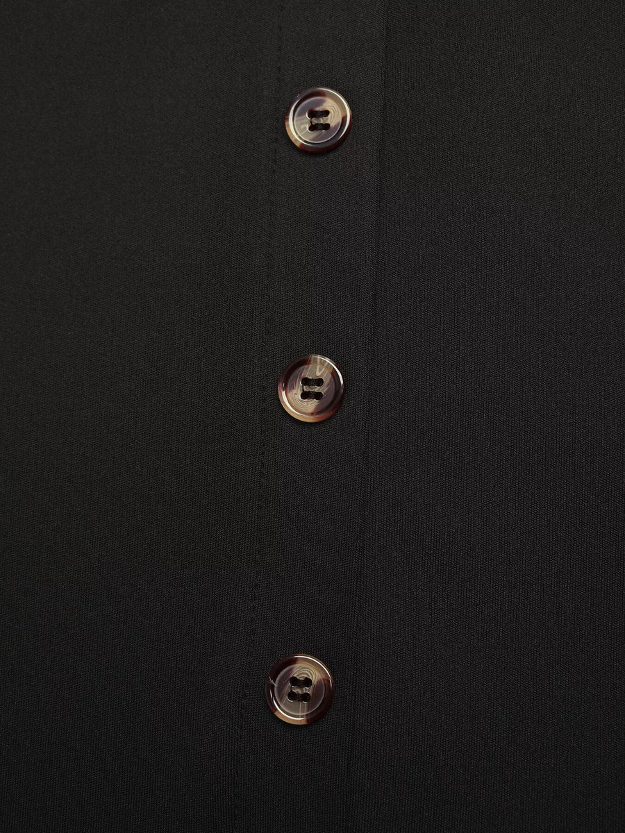 Black midi skirt with tortoise shell button front detail