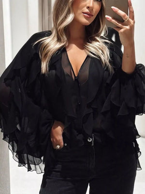 Black sheer long-sleeve blouse with ruffled details and V-neck