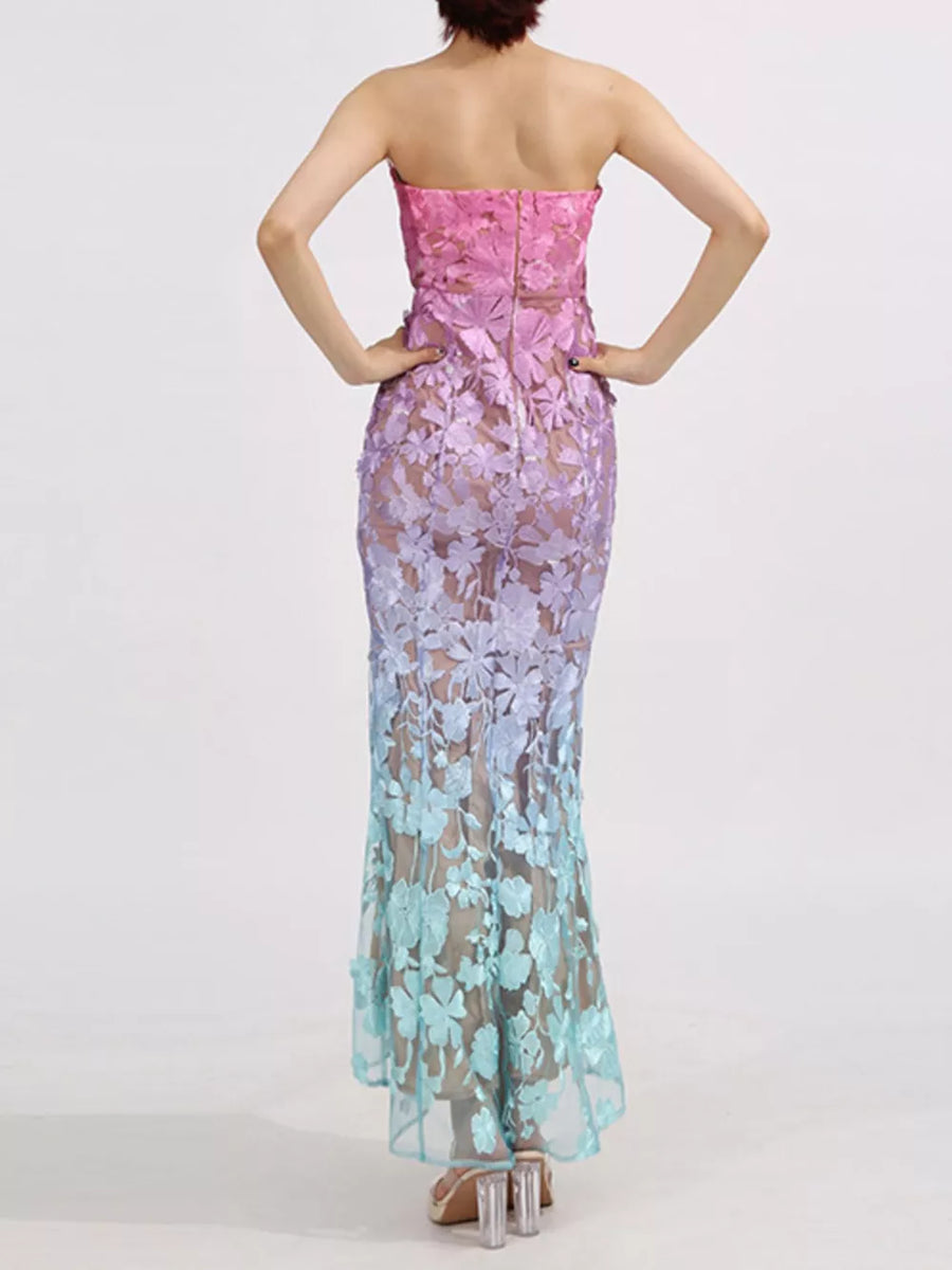 Strapless floral lace maxi dress with ombre pink to blue gradient and sheer overlay.