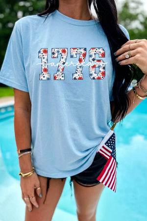 Light blue cotton t-shirt with floral 1776 America graphic and relaxed fit