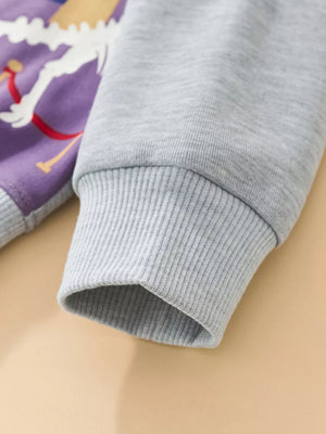 Light gray baby sweatshirt with ribbed cuff and dinosaur graphic detail.