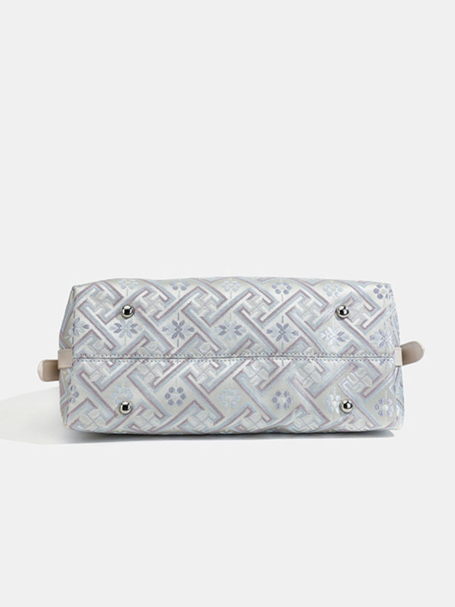 handbag featuring geometric in cream with Polyester Imported Size &amp texture