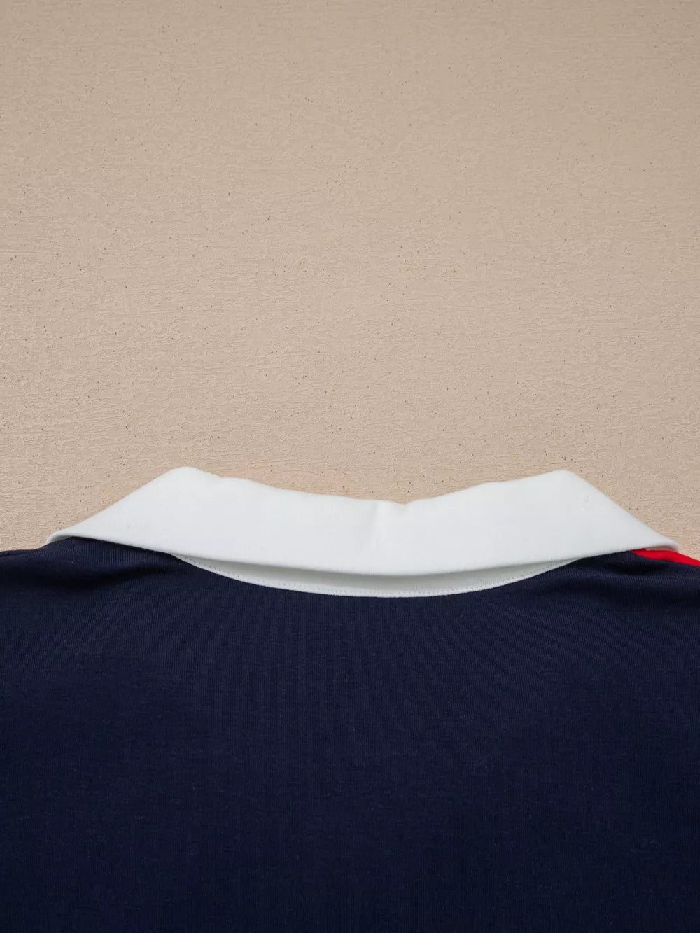 Americana colorblock mini dress with white collar and red stripe detail.