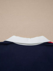 Americana colorblock mini dress with white collar and red stripe detail.