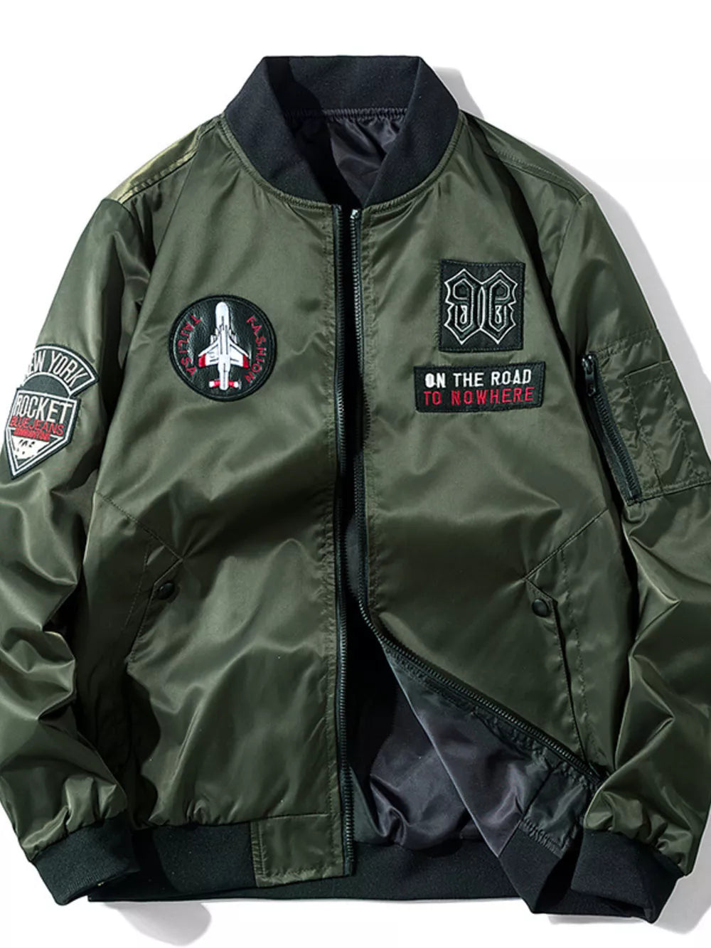 Army green bomber jacket with embroidered patches including a jet and text.