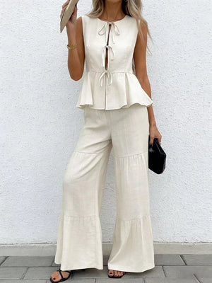Beige tie-front peplum top with tiered wide-leg pants set