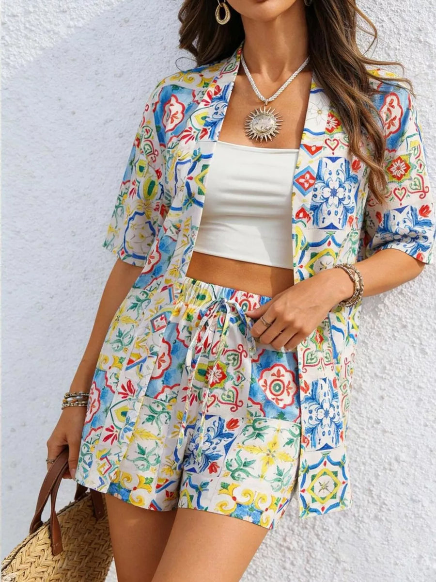 Women's bikini shorts with drawstring waist and vibrant tile print.
